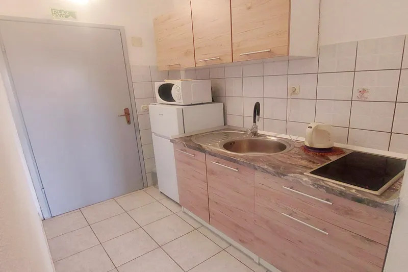 Apartman A5 – prostran smještaj u Podaci s pogledom na more kitchen